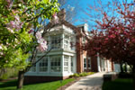 Flowering crabapples and the fragrance of nearby lilac bushes greet guests at the President’s Residence.