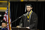 Graduating senior John Komdat gives encouraging remarks to his fellow classmates.
