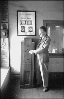 Prof. E.B. Kurtz, College of Engineering, tuning a television receiver at W9XK, ca. 1934