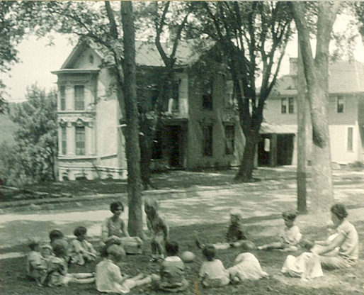 photo: Children and teachers playing game outdoors
