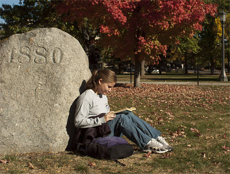 Student by 1880 boulder, October 2005