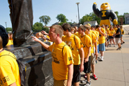 As they arrived at Kinnick for the Friday kickoff event, students touched the iconic statue of the stadium’s namesake.