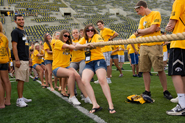 Games on the Kinnick Stadium field prompted new classmates to pull together.