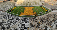Students formed a massive block I on the Kinnick field—what organizers expect to become an On Iowa! tradition.