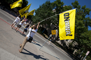 Flag-bearers guided the class from Convocation to the President’s Block Party.
