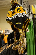 Anyone who attends games at Kinnick Stadium in the fall knows well how low the temperature can dip. Earflaps will be welcome come November, and they might as well be stylish.