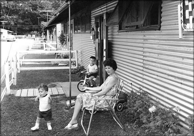 Mother with children at Riverside Park unit, 1966