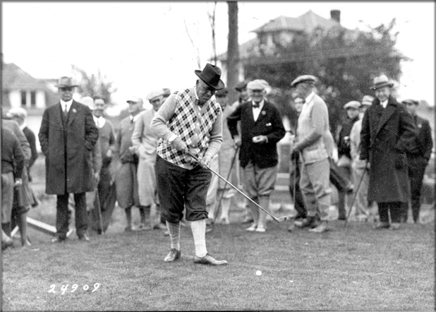 photo: University president Walter Jessup tees off at the dedication of the new Finkbine Golf Course, October 1925.
