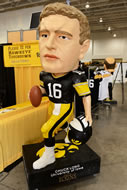 A featured guest at the FRY Fest trade show was a giant bobble head figure of former Hawkeye quarterback Chuck Long.